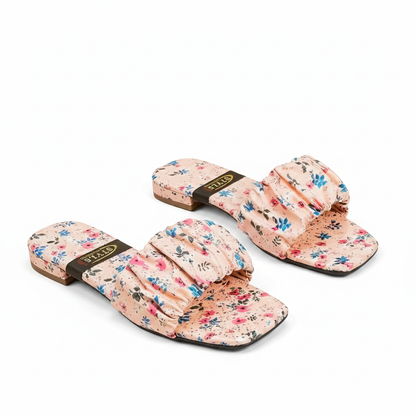 Pink floral ruched flat sandals pair - white background